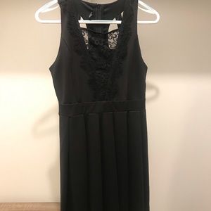 Classic mini black dress with beautiful details